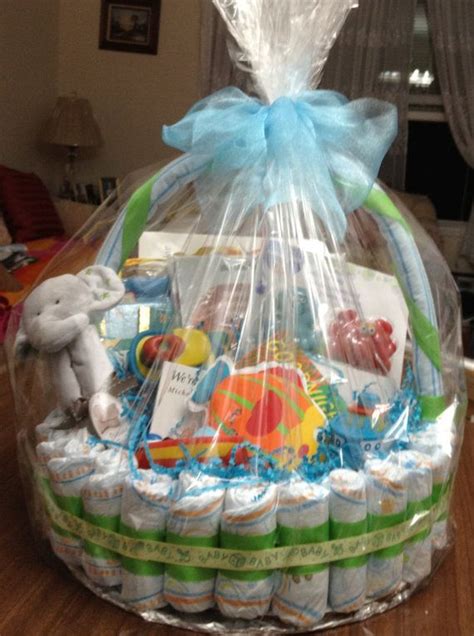 Need some ideas for homemade newborn shower gifts? Diaper basket | Baby shower baskets, Baby shower gift ...