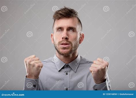 Angry Man Clenching His Fists In Frustration Stock Photo Image Of Anxiety Funny
