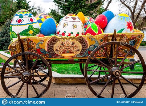 Beautiful Easter Eggs In Old Truck With Big Wheels In The Park Stock