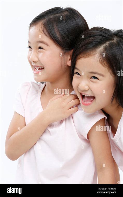 Smiling Twin Girls Stock Photo Alamy