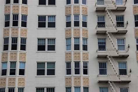 Free Stock Photo Of Windows And Fire Escapes On Apartment Building