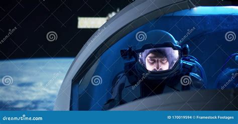 Astronaut Looking Out Of Spaceship Window Stock Photo Image Of