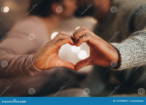 close up of hands of a couple making a heart shape stock image image of heart bedroom 131940961
