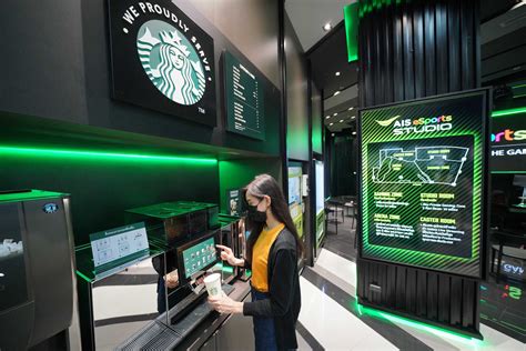 starbucks thailand s first self service machine gives a jolt to gamers