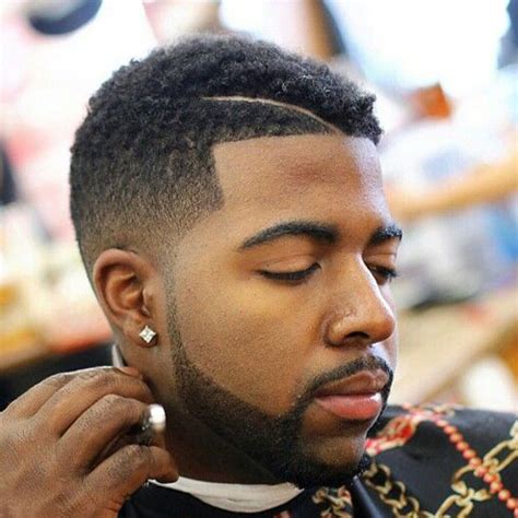 This taper haircut for black men will be a wonderful choice for those who like being outstanding. Afro Taper Fade Haircut (2020 Guide)