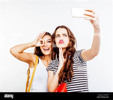 Two Best Friends Teenage Girls Together Having Fun Posing Emotional On White Background