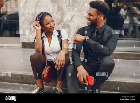 A Stylish And Beautiful Dark Skinned Couple In A City Stock Photo Alamy