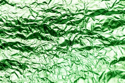 Green Texture Of Crumpled Sheet Of Aluminum Foil Foil Background