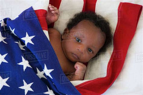Baby Wrapped In American Flag Stock Photo Dissolve