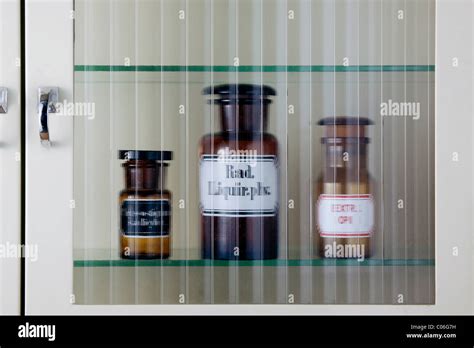 Old Medicine Bottles In A Medicine Cabinet Stock Photo Alamy