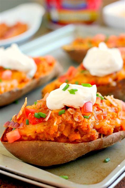 We've been loving sweet potatoes lately. Loaded Twice Baked Sweet Potatoes - Pumpkin 'N Spice