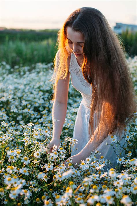 Woman Picking Flowers By Stocksy Contributor Liliya Rodnikova Stocksy