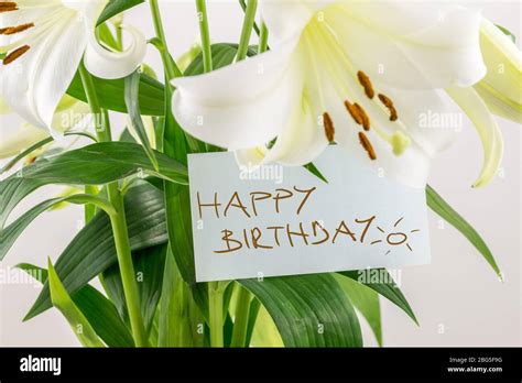 T Of Fresh Flowers On A Birthday With A Bouquet Of White Lilies With