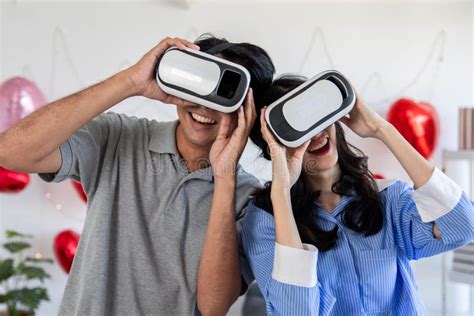Couple Of Love Playing Video Games Together Wearing Vr Glasses With Fun