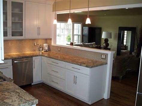 Casual displays on the countertops add color and personality to. Knock out part of the wall to create open concept ...