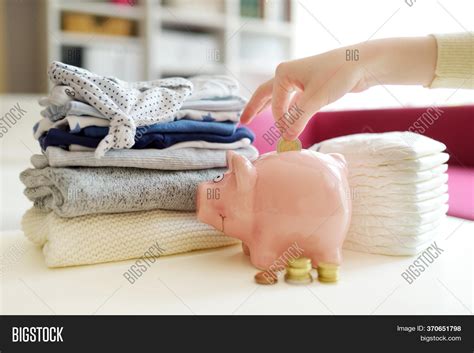 Pile Baby Clothes Image And Photo Free Trial Bigstock