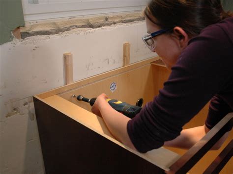 While not as apparent as some of the other tips on this list, another important part of learning how to install kitchen cabinets isto get good screws when building. Installing Kitchen Cabinets: Pictures & Ideas From HGTV | HGTV