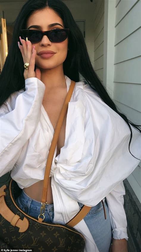 Kylie Jenner Poses In A Casual White Shirt And Denim Jeans After