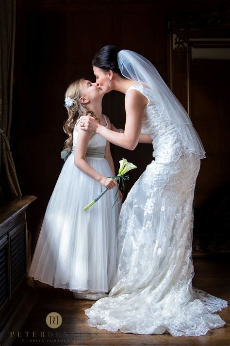 A Beautifully Captured Natural Moment As The Bride Kisses Her Daughter