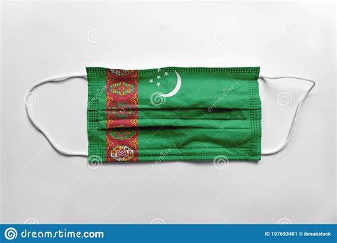 Face Mask With Turkmenistan Flag Printed On White Background Isolated