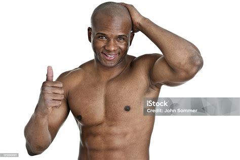 Muscular Man Giving Thumbs Up Stock Photo Download Image Now