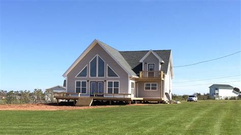 Boasting accommodations with a private pool, garden view and a balcony, perfect beach house is set in lakhania. Skyeview Beach House - PEI Summer Rental Cottages