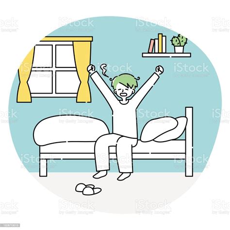 A Man Waking Up In The Morning And Yawning On His Bed Stock