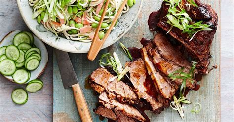 Finish with a sprinkle of fresh sesame seeds and sliced greens onions! Slow-cooked teriyaki beef with sesame udon noodle salad