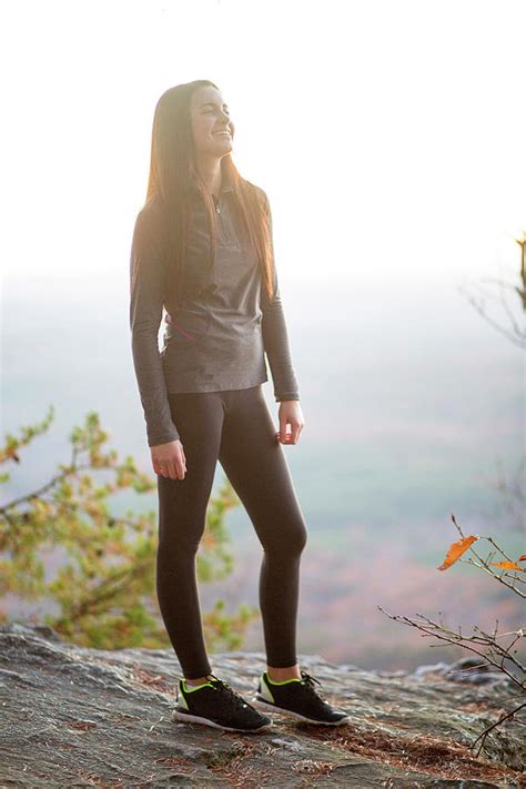 A Young Woman Smiles After A Hike Photograph By Corey Nolen Fine Art