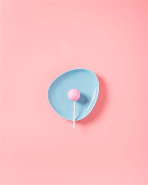 Download Captivating Solid Pastel Blue Lollipop Wallpaper