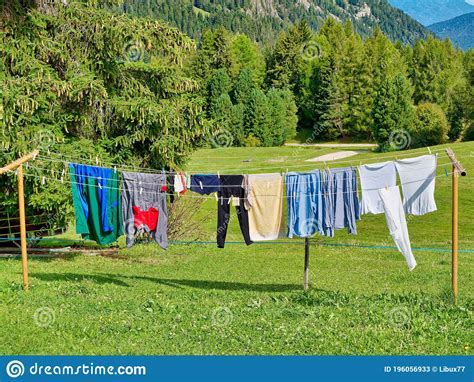 Laundry Hanging On Clothesline Outdoor In The Green Nature Stock Image