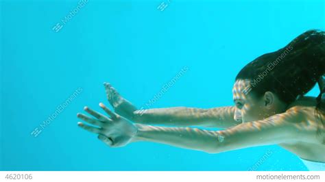 Woman Swimming Underwater Stock Video Footage