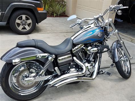 What's wide up front, low in the back and round at both ends? 2014 Harley-Davidson® FXDWG Dyna® Wide Glide® (Charcoal ...