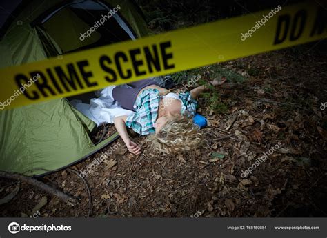 Crime Scene Woman Playing Dead Lying On The Ground Stock Photo By