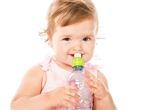 Infant Child Baby Girl Sitting With Big Bottle Of Drinking Water Stock