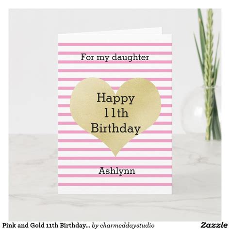 A Pink And Gold Striped Birthday Card With A Heart On The Front That