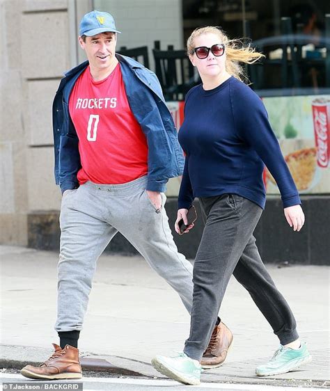 Amy Schumer And Her Husband Chris Fischer Take A Brisk Walk Through The Deserted Manhattan