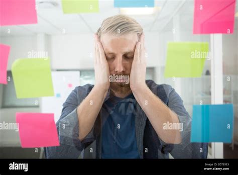 Work Induced Stress Concept Young Man Overwhelmed Stock Photo Alamy
