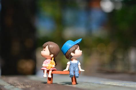 We have a massive amount of hd images that will make your computer or smartphone. Toy Couple Sitting on Bench Love Wallpaper | HD Wallpapers