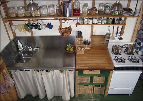 To work with a small kitchen pantry, make use of cabinet organizers. Small Cabin Kitchen | cabin dreams | Pinterest