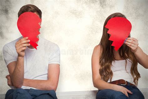 A Composite Image Of Couple Holding Broken Heart Stock Photo Image Of