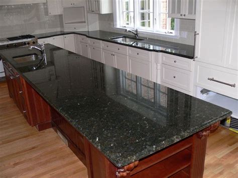 Maybe you would like to learn more about one of these? Peacock Green Granite | Glass kitchen cabinet doors, Glass ...