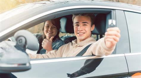 Happy Student Of Driving School Showing Car Keys Stock Image Image Of