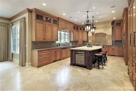 Beige, cream, light brown and soft nuances of peach tiles also work with hickory cabinets. 153 Traditional and Modern Luxury Kitchens - Pictures