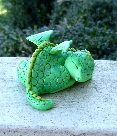 Food coloring is used to create colored sculpting clay. Ooak handmade polymer clay Sleeping Baby Dragon by Mystic ...