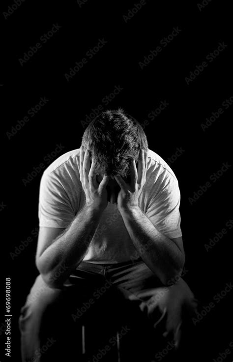 Wasted Man Suffering Emotional Pain And Deep Depression Stock Photo
