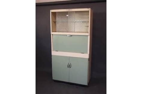 Maybe you would like to learn more about one of these? A 1950s 'Eastham' kitchen cabinet with fold down work ...