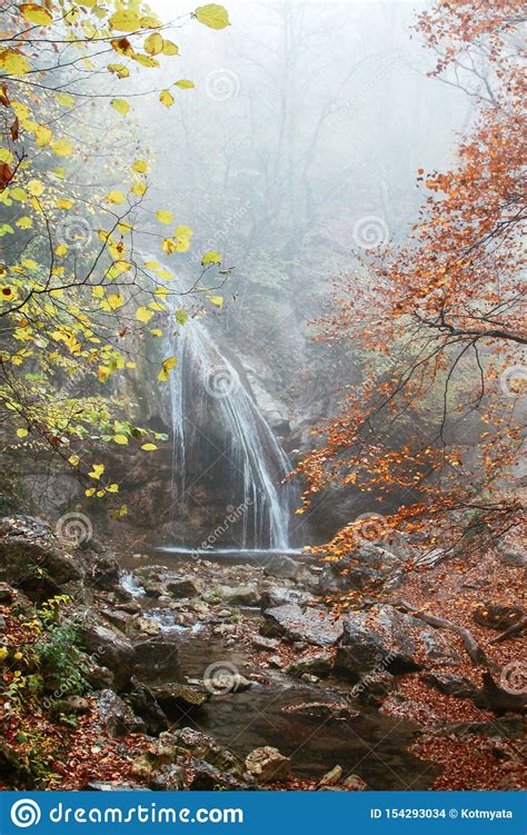 Beautiful Waterfall In Autumn Forest In Crimean Mountains Stones With