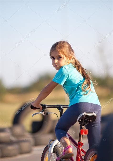 Girl On Back Of Bike