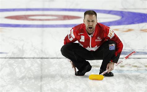 Canada Skip Brad Gushue Directs Sweepers During A Qualification Game Against The United States